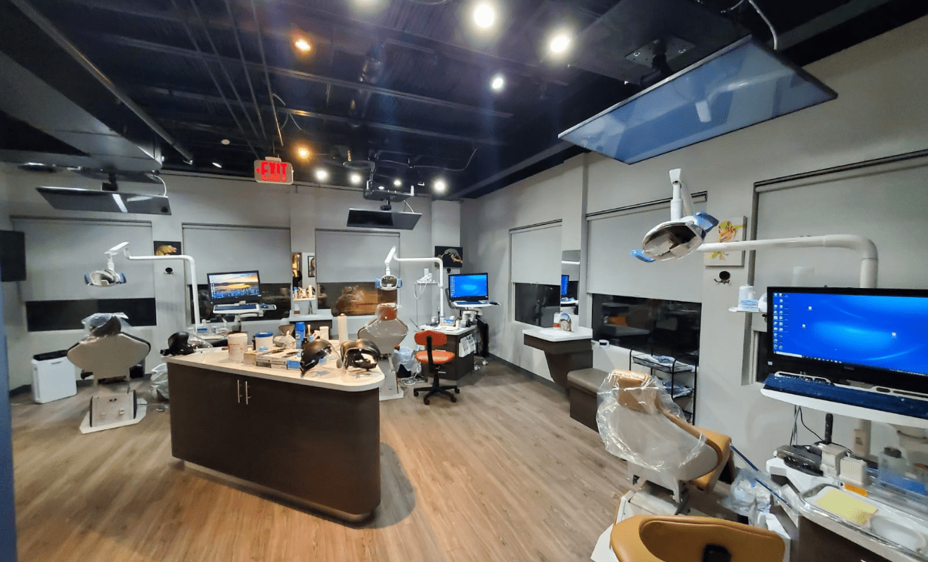 Open-concept orthodontic treatment floor with multiple stations