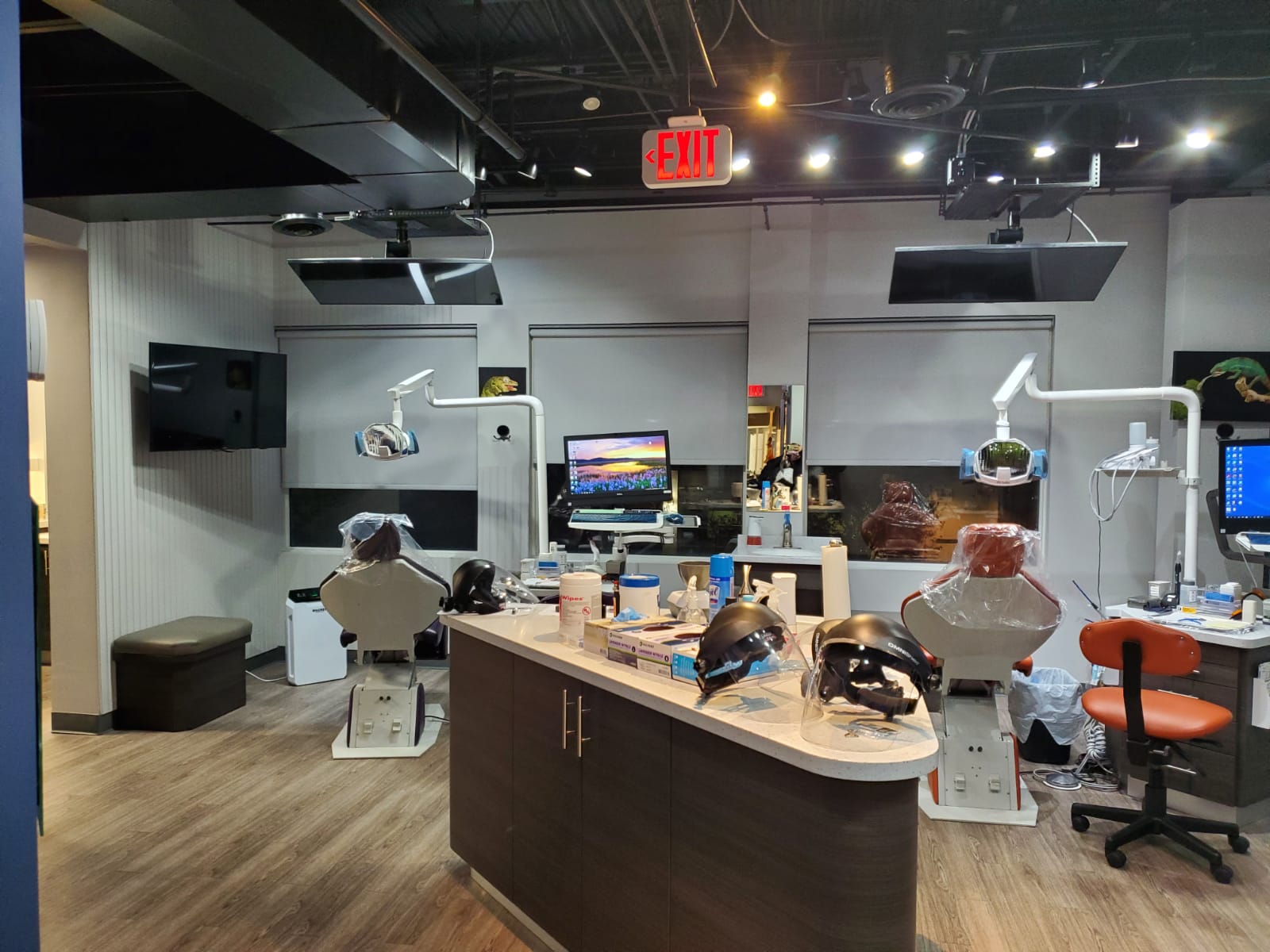 Orthodontic treatment stations with digital displays